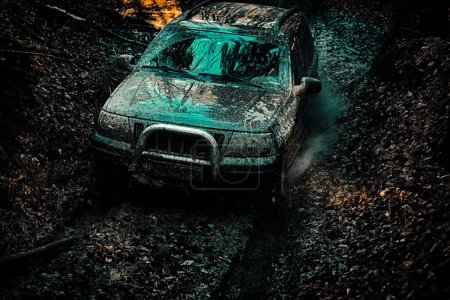 Photo for Off the road travel on mountain road. Track on mud. 4x4 Off-road suv car. Offroad car. Safari. Drag racing car burns rubber. Extreme - Royalty Free Image