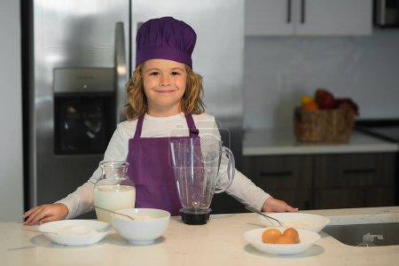 Photo for Chef child cook baking on the kitchen - Royalty Free Image
