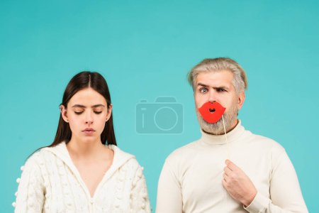 Photo for Gender concept. Tolerance and gender identity concept. Female and male sex icon. Funny couple of woman with moustache and man with red lips - Royalty Free Image