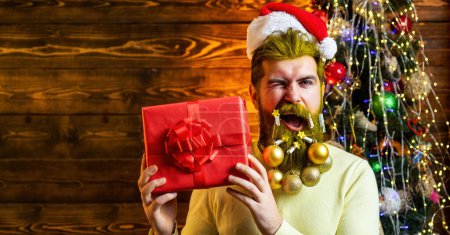 Photo for Funny excited santa portrait for banner. Hipster Santa with decorated beard. New Year, Christmas card. Gift emotions. Santa portrait for poster - Royalty Free Image