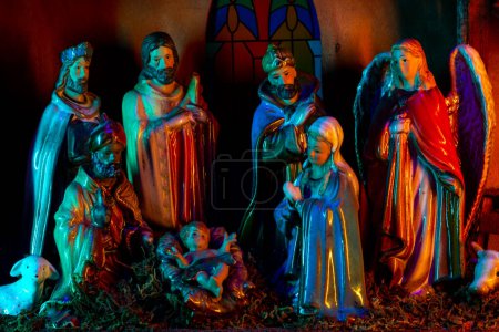 Photo for Nativity of Jesus. Christmas Jesus in crib. Christmas nativity scene of born Jesus Christ in the manger with Joseph and Mary. Traditional Christmas nativity scene of baby Jesus in the manger - Royalty Free Image