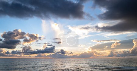 Photo for Sea sunset with sky and sun through the clouds over. Ocean and sky background, seascape. - Royalty Free Image