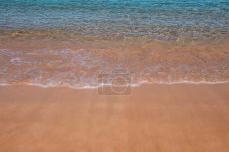 Photo for Beach background. Calm beautiful ocean wave on sandy beach. Sea view from tropical sea beach - Royalty Free Image