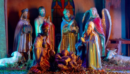 Photo for Christmas nativity scene. Christmas scene of born child baby Jesus Christ in the manger with Joseph and Mary - Royalty Free Image