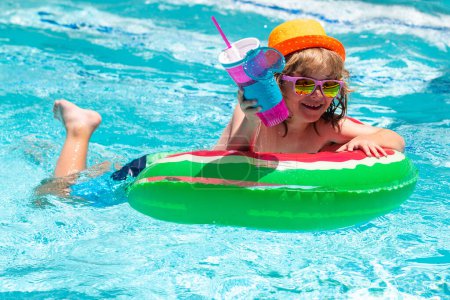 Photo for Child swim in poolside in water background. Child in swimming pool. Summer activity. Healthy kids lifestyle - Royalty Free Image
