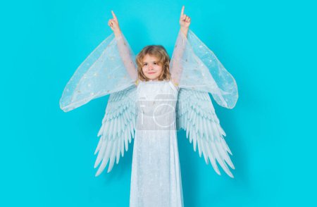 Photo for Kid wearing angel costume white dress and feather wings. Innocent child. Little angel on isolated studio background - Royalty Free Image