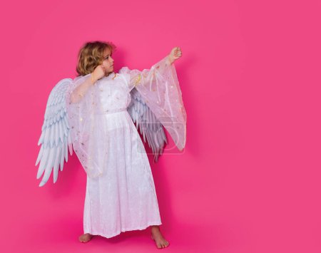 Photo for Cute angel kid, studio portrait. Blonde curly little angel child with angels wings, isolated background - Royalty Free Image
