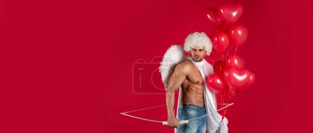 Photo for Valentines Day banner with sexy angel man. Handsome man angel. Valentines Day concept. Sexy athlete guy with angels wings. Cupid. Amour. February 14. Arrow of love. Isolated on red - Royalty Free Image