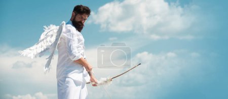 Photo for Happy Valentines Day. Crazy bearded angel man aiming with the arrow. Humor comical concept - Royalty Free Image