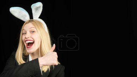 Foto de Easter banner, mockup copy space, poster flyer header for website template. Fashion studio photo of sexy beautiful girl with blond hair with bunny ears. - Imagen libre de derechos