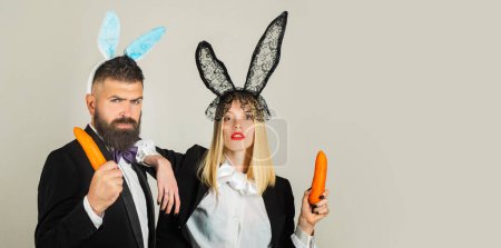 Photo for Easter banner, mockup copy space, poster flyer header for website template. Easter couple with carrot like a hare. Happy Easter. Funny bunny and carrot concept - Royalty Free Image