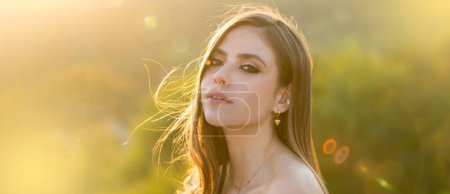 Photo for Spring woman on sunlight romantic portrait, sensual sunny face. Banner for website header. Natural female beauty. Young woman with clean fresh skin - Royalty Free Image