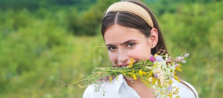 Photo for Portrait of sensual woman in spring background. Banner for website header. Funny woman on spring field outdoor. Happy girl face enjoying a summer sunny day - Royalty Free Image