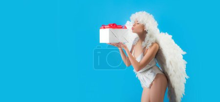 Photo for Banner with sexy angel woman. Angel with gift. Valentines Day: Gift, Romantic and Date. Romantic Gifts and Valentines Gift Ideas. Banner flyer template for advertising for header design - Royalty Free Image