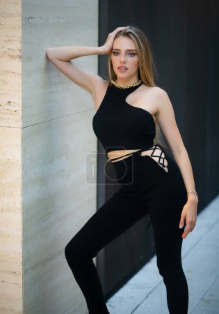 Photo for Beautiful girl. Sensual woman, fashion model in style casual clothes dress posing on street outdoor. Summer collection of stylish girl - Royalty Free Image