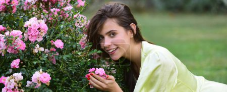 Photo for Portrait of sensual woman in spring background. Banner for website header. Summer woman in rose garden outdoors. Natural beauty girl enjoy spring recreation - Royalty Free Image