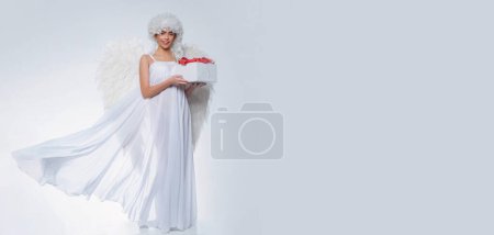 Photo for Valentines day banner with sexy angel woman. Girl with angel wings and a white dress. Angel girl. Cupid woman - Royalty Free Image