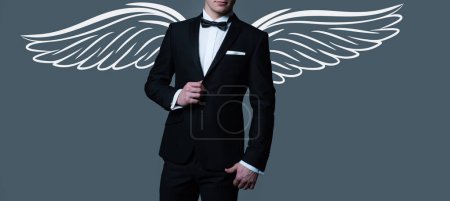 Foto de Photo banner of sexy man with wings for valentines day. Male suit fashion. Formal suit classic style outfit. Elegant and stylish hipster. Business clothes. Rich lifestyle. Man angel - Imagen libre de derechos