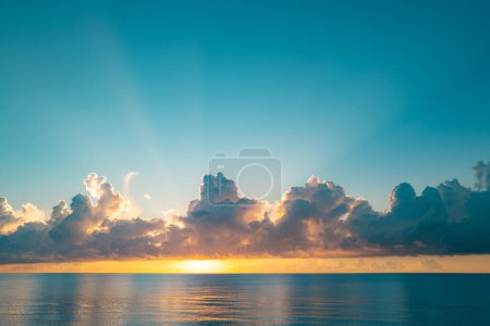 Photo for Sunset on sea. Beach sunrise with cloudy sky - Royalty Free Image