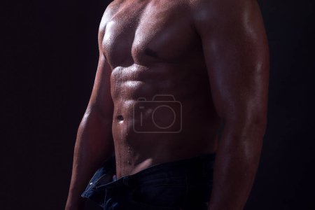 Foto de Muscular shirtless manked man model showing strong shoulders, bare chest. Gay sexy model - Imagen libre de derechos
