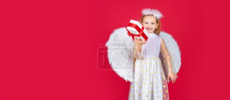 Foto de Valentines day banner with angel child. Angel children girl with white wings Cute baby child with angel wings - Imagen libre de derechos