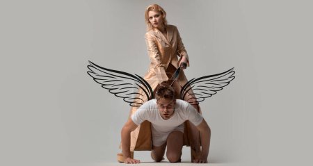 Téléchargez les photos : Angels couple, valentines day photo banner. Lovers man and woman are preparing for role playing games. Dominatrix blonde woman holding her husband in collar and make him obey - en image libre de droit