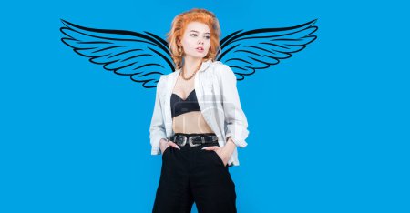 Téléchargez les photos : Valentines day banner of sexy woman angel with wings. High Fashion model woman posing in studio on blue backgroun isolated - en image libre de droit