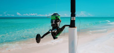 Photo for Fishing Sea and Summer vacation. Fishing rod, spinner, fish-rod. Relaxing seascape - Royalty Free Image