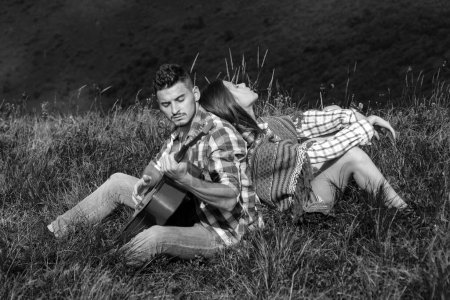 Photo for Celebrating Saint Valentines Day. Beauty Girl and her Handsome Boyfriend on camping - Royalty Free Image