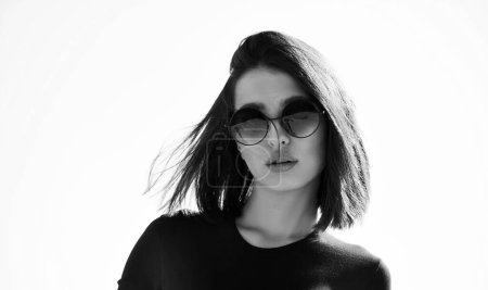 Photo for Beauty model girl with sunglasses. Sensual woman. Beautiful fashion model posing with glasses. Beautiful young model with big glasses-close up - Royalty Free Image