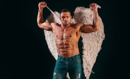 Photo for Muscle strong beautiful stripped male model valentin. Handsome sexy man with angel wings. Valentines Day, 14 February - Royalty Free Image