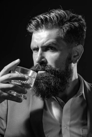 Photo for Bartender with glass whiskey. Sad man with depression looking in camera. Alcoholic drinking alcohol. Depressed and hopeless people after drunk alcohol - Royalty Free Image