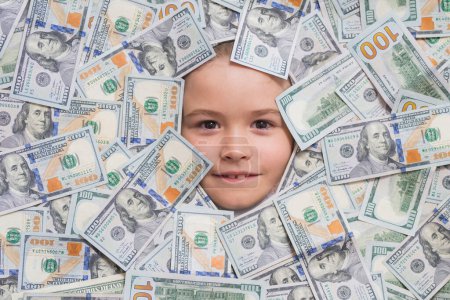 Photo for Money banknotes, cash dollars bills. Child head in money. Fun kid face on dollars money - Royalty Free Image