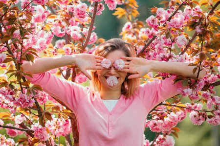 Photo for Concept of happy women on International Womens Day. Cherry Blossom Events and Locations. Sakura Cherry Blossom Festival - Royalty Free Image
