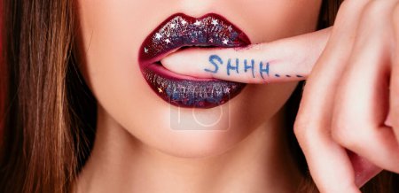 Photo for Shh. Sexy Lips. Bright lipgloss or lipstick. Woman secrets. Sign of silence - Royalty Free Image
