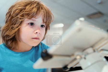 Photo for Kid in electronics shop. Digital equipment and electronics. Sale of smart tech - Royalty Free Image