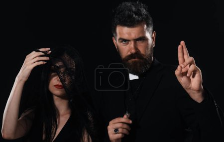 Photo for Funeral. Priest Blessing gesture. Pastor with woman-widow - Royalty Free Image