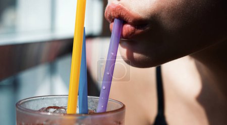 Photo for Female lips drinking cocktails. Alcohol drink in bar - Royalty Free Image