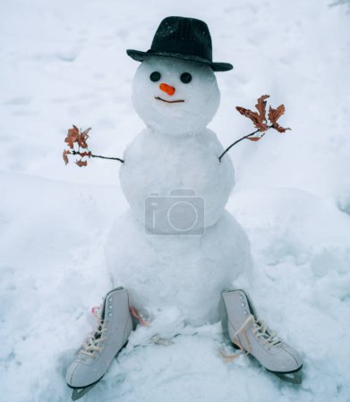 Photo for New Year greeting card. New year concept. Funny snowmen. Happy snowman with gift boxes standing in winter Christmas landscape - Royalty Free Image