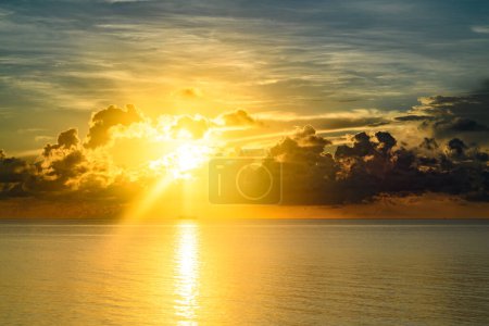 Photo for Sunset sea landscape. Colorful beach sunrise with calm waves. Nature sea sky. Tropical beach seascape horizon. Sunrise with clouds of different colors against the blue sky and sea - Royalty Free Image