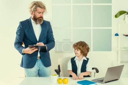 Photo for Little boy dreaming about businessman profession. Childhood and dream concept. Team job - Royalty Free Image