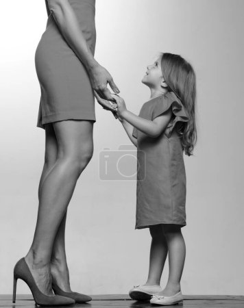 Photo for Growing up, parenthood, childhood concept. Mother and daughter. Admonition. Mothers Day love family - Royalty Free Image