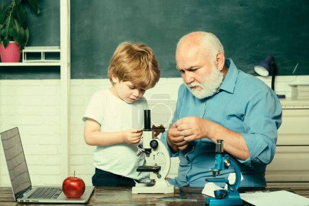 Photo for Teacher is skilled leader. Grandfather and grandchild. Concept of a retirement age. Learning and education concept. Grandfather and grandson - Royalty Free Image