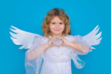 Photo for Cute angel child, studio portrait. Angel kid with angels wings, isolated background - Royalty Free Image