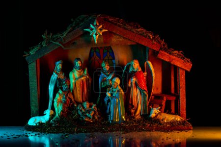 Foto de Nativity of Jesus. Biblical Mary holding baby Jesus. Christmas theme - Imagen libre de derechos