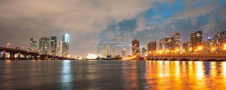Photo for Night Florida Miami city skyline. USA skyscrappers downtown. Landscape of twighlight town - Royalty Free Image