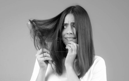Photo for Woman worried about hair loss. Hair fall problem - Royalty Free Image