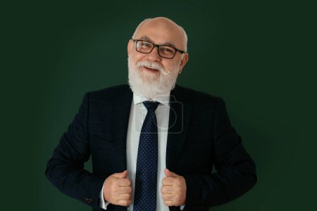 Photo for Confident middle-aged male teacher or professor standing in front of a blank chalk board. Funny professor or scientist in a elegant black suit. Teachers day - Royalty Free Image