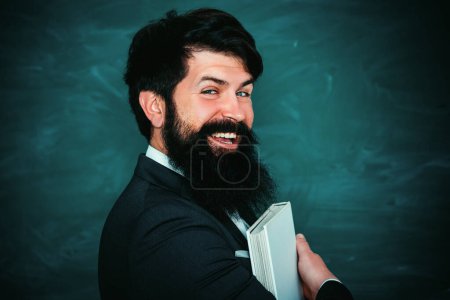 Photo for Teachers day. Professor in class on blackboard background. Chalkboard copy space - Royalty Free Image