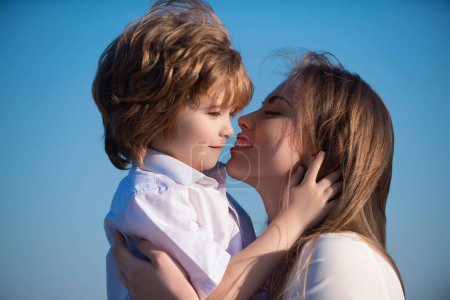 Photo for Mothers love. Closeup portrait of mother and child kissing. Mother hugging and embracing son. Mothers day, love family. Mother and child with tenderness. Mothers kiss child, cuddle warm relationships - Royalty Free Image